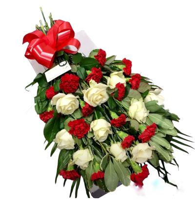 Tied Sheaf SYM 980 - This tied sheaf features red carnations and white roses with complimentary foliage